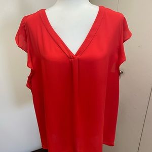 Beautiful bright poppy colored top perfect for any occasion.